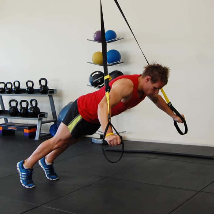 Man performing the TRX fly